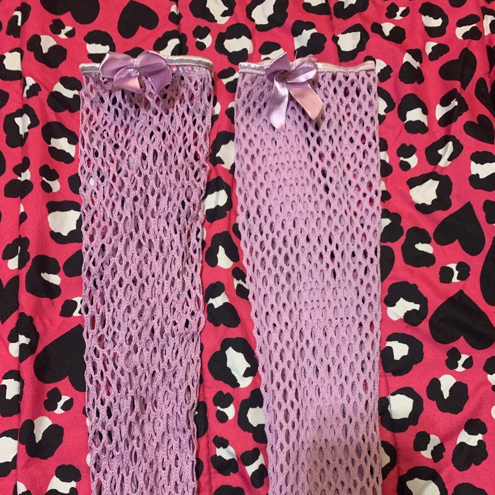 Purple fishnets with bow
